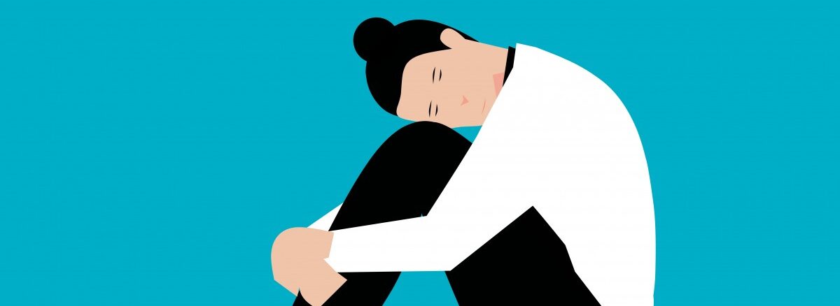 Art representation of depression in an individual with a woman can be seen sitting alone and holding her head in her lap seemingly depressed